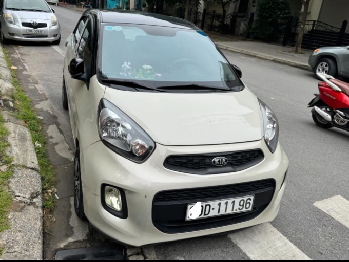 Chiếc xe Kia Morning chưa được sang tên chủ mới. Ảnh: Mai Hương